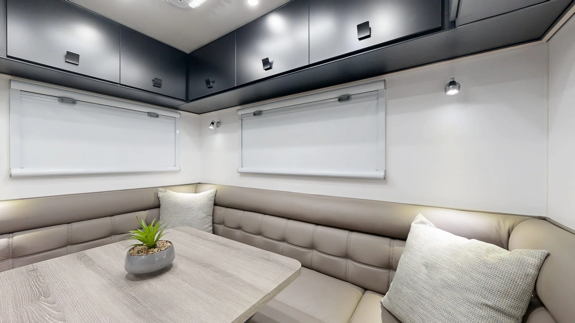 Salute Senator rear club lounge seating and overhead cabinetry