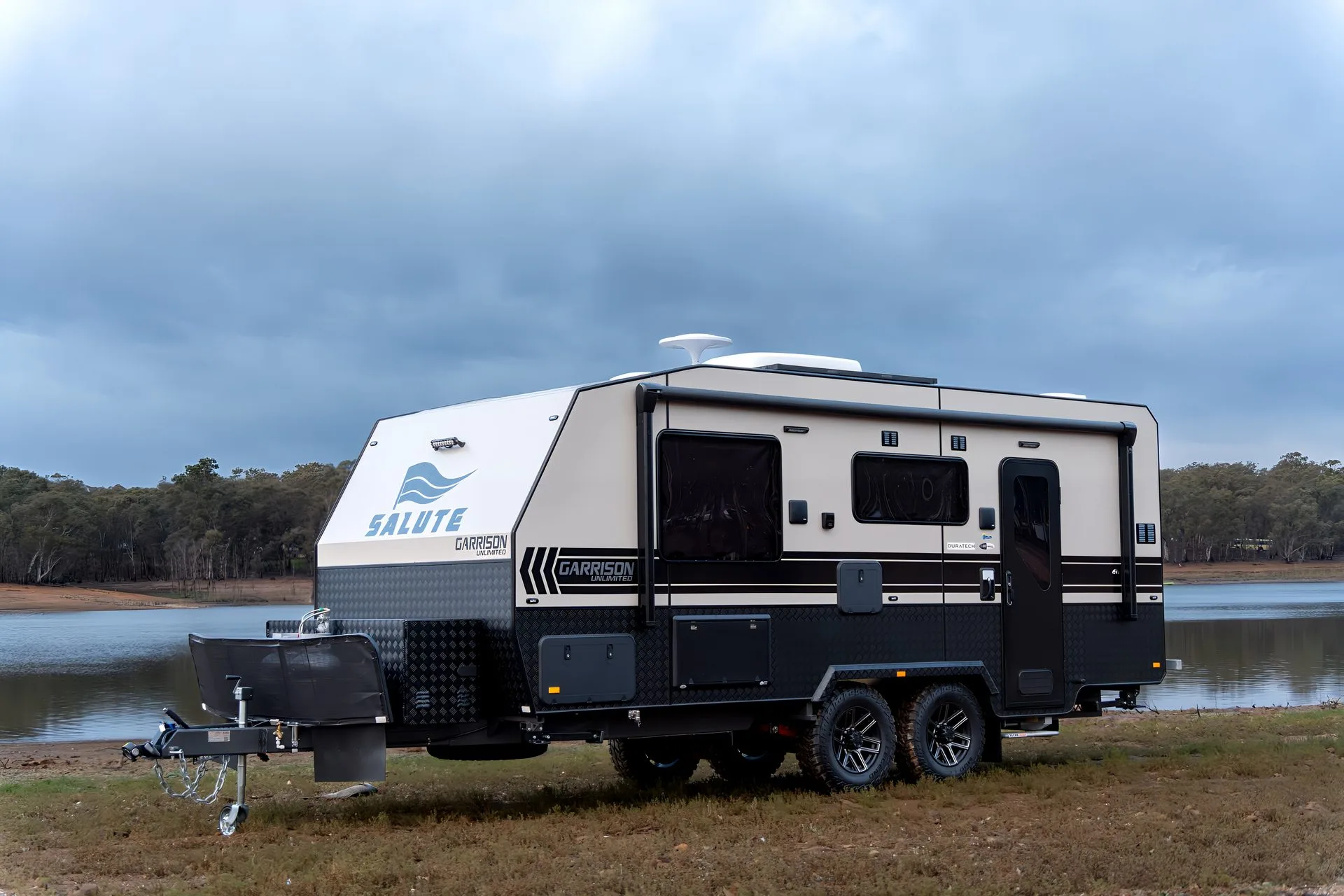 Salute Garrison off-road caravan beside a lake